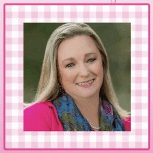 Author Susan M. Boyer, smiling portrait with a colorful scarf.